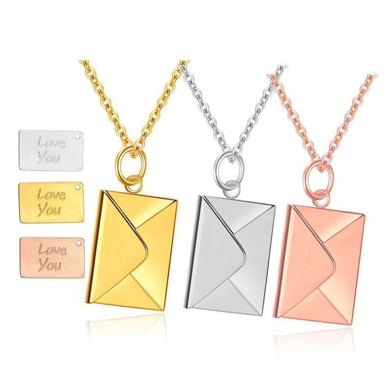 A set of three Love Letter Envelope Pendant Necklaces in gold, silver, and rose gold, each featuring an envelope design with a "love you" inscription card. These embody the latest fashion style.