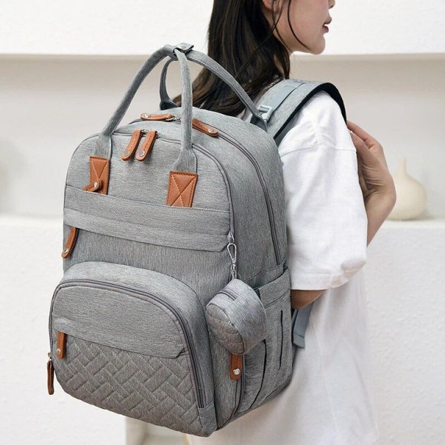 Multifunctional Diaper Bag Backpack with Changing Station - Waterproof, Spacious, and Versatile for Modern Parents - Image 4