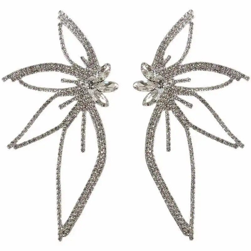 A pair of chic maple leaf zircon earrings with crystal embellishments, perfect for the latest fashion trends.